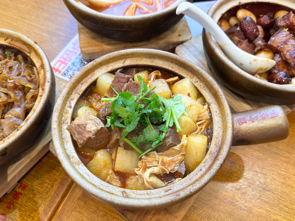 A must try is this comforting Braised Beef Brisket Claypot with tender beef cut into cubes and braised radish — Picture by Lee Khang Yi