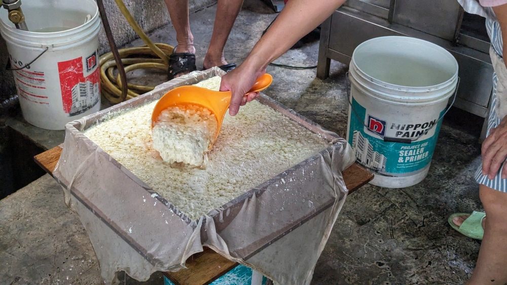 Tofu being made from scratch, for special orders only — Picture by Ethan Lau