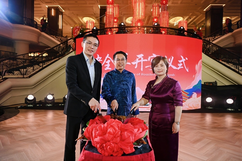 (From left) IOI Properties Group Head Of Hotels Alan Yau, Malaysia Tourism Promotion Board Deputy Director General (Promotion Il) Samuel Lee Thai Hung and Xi’an Heritage Brands Association President Yang Xiao during the lamb ceremony and blessing ritual. — Picture courtesy of IOI Properties Group