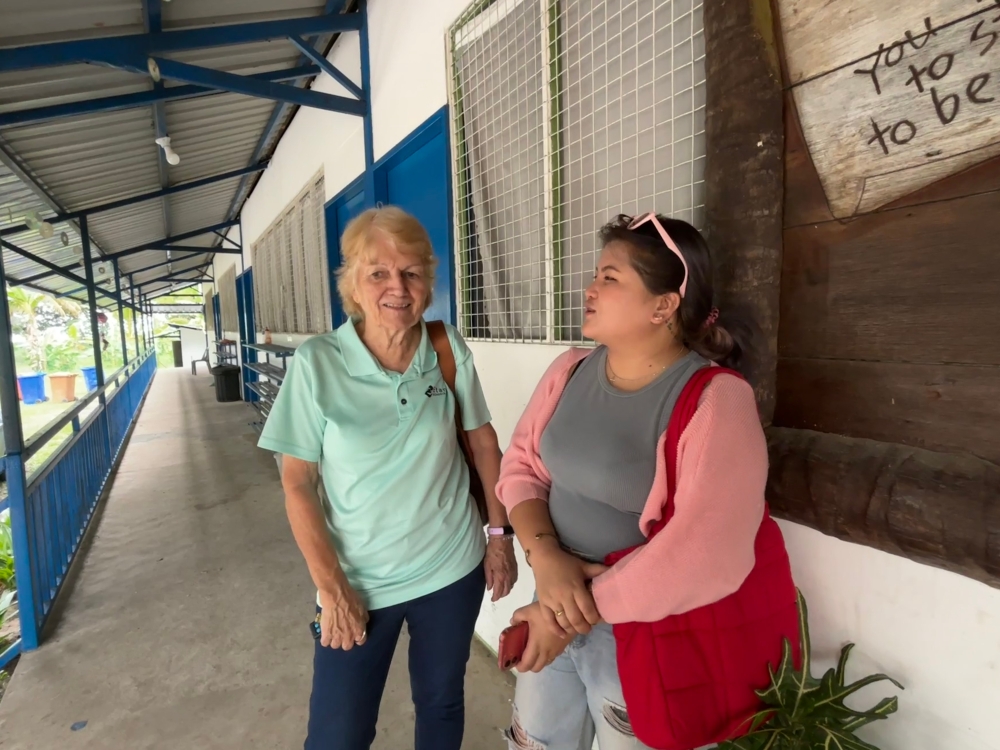 Kathryn Rivai (left) pictured at the Etania school in Kinarut, Sabah. — Picture by Julia Chan