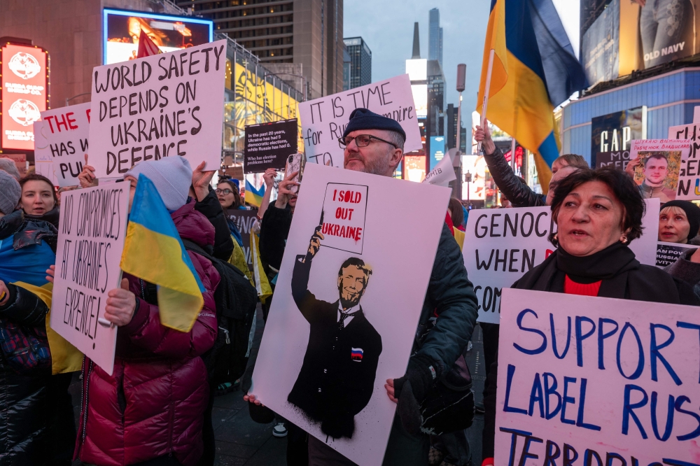 Supporters of Ukraine rally in Times Square to mark the three-year anniversary of the invasion by Russia on February 24, 2025 in New York City.  — AFP pic