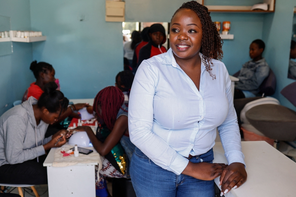 Master craftswoman and salon owner Jane Anjili poses for a photograph inside her salon in Nairobi on January 17, 2025. — AFP pic 