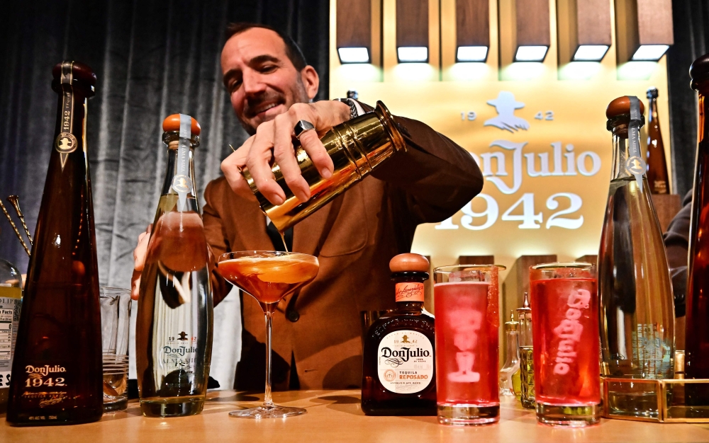 A cocktail featuring Don Julio Tequila Blanco is made during a demonstration of mixed drinks in Hollywood, California, on February 25, 2025 during a media preview of the food, beverages and decor for the Governors Ball, the Academy's official post-Oscars celebration, which will immediately follow the 97th Oscars ceremony on March 2. — AFP pic