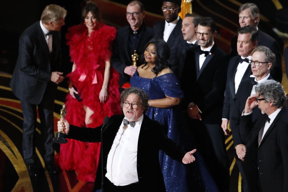 Producer Charles B. Wessler speaks onstage alongside cast and crew of ‘Green Book’ after the film won the Best Picture award at the 91st Academy Awards, February 25, 2019. — Reuters pic