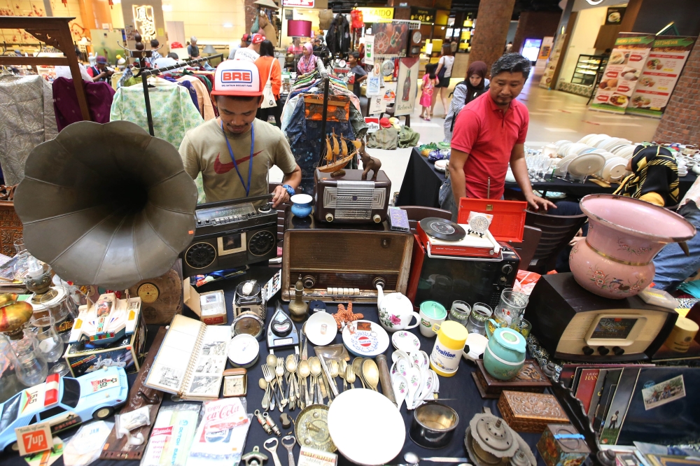 A blast from the past to spark and encourage conversations with people with dementia on any topic, such as hobbies. Pix shows vintage items at a collectors’ event. — File picture by Azinuddin Ghazali